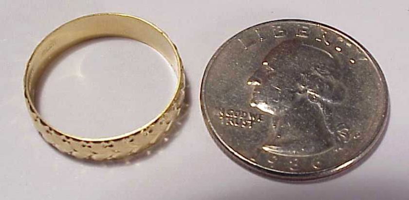 Weighs 3.0 grams Band measures about 4.90mm wide Hallmarked 18K 