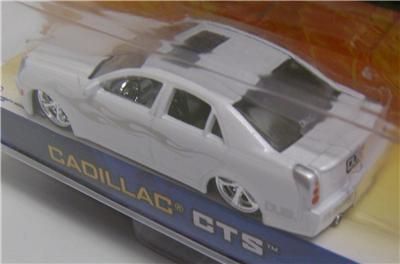 CADILLAC CTS PEARL WHITE DUB CITY JADA DIECAST 164  